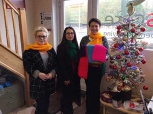 Care at home service user knitted these scarves for charity